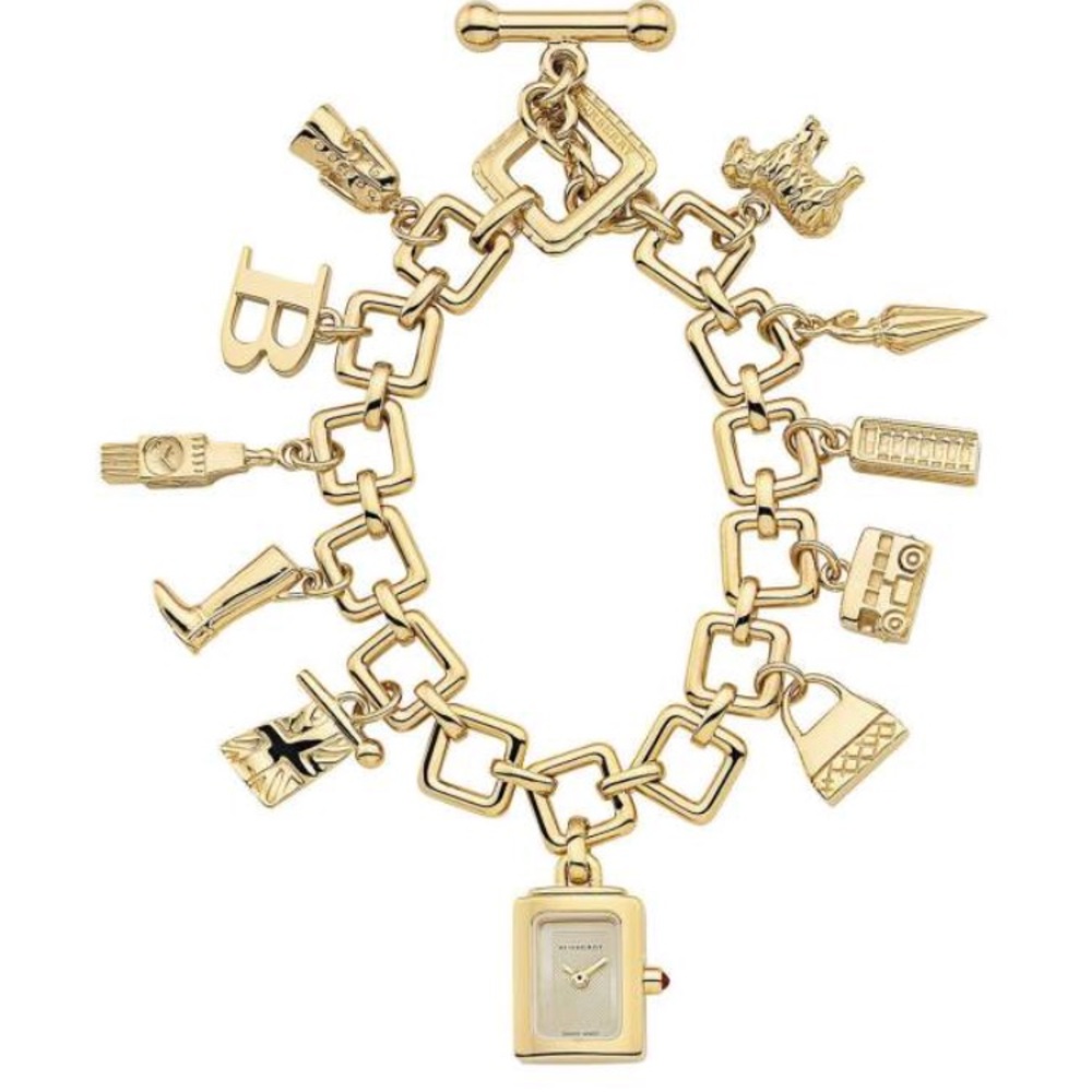 Burberry gold tone charm bracelet watch
